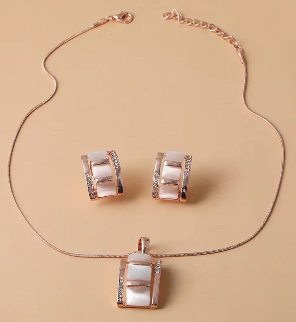 Conjunto cadena veneciana con dije más aros baño oro rosa