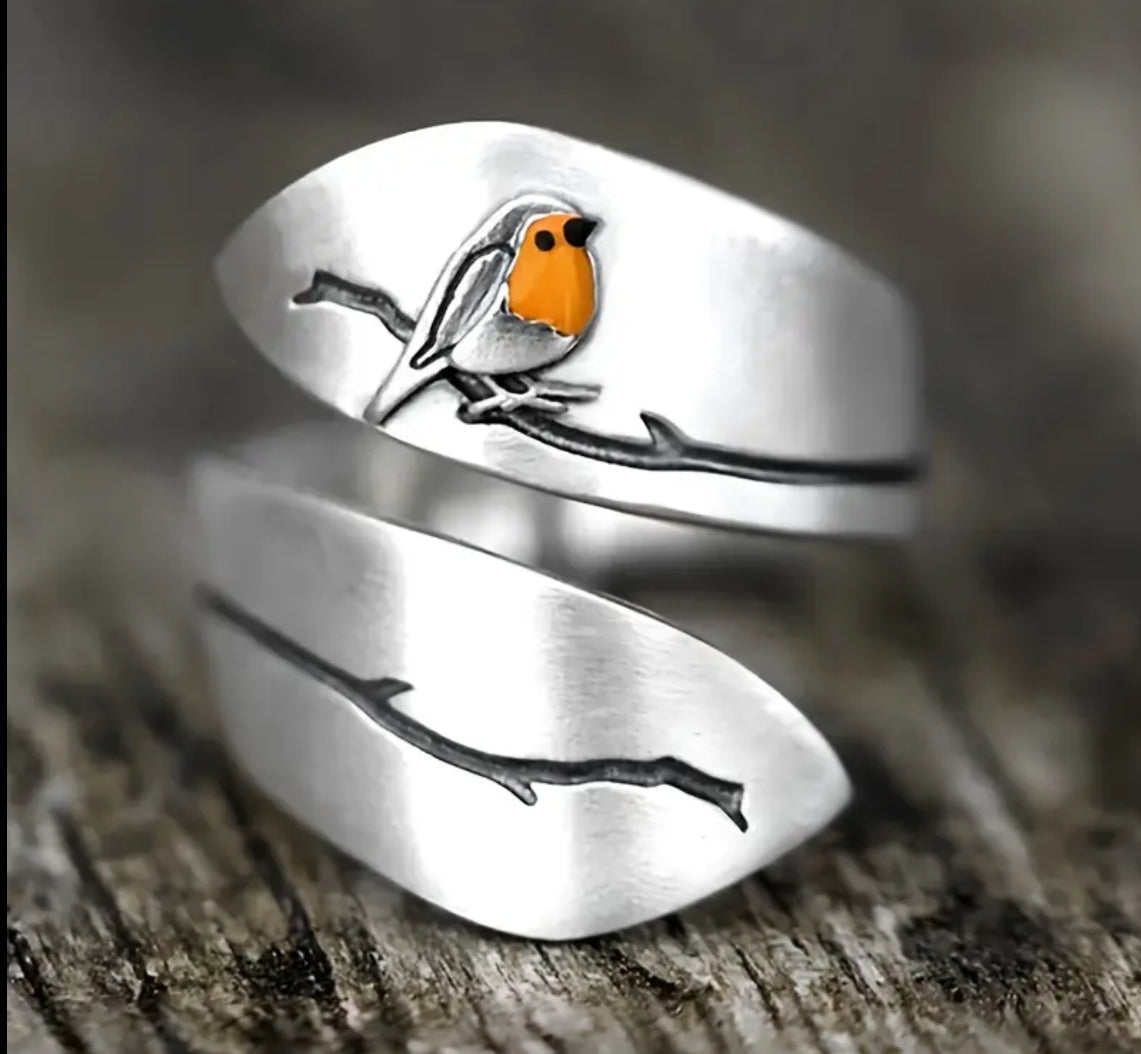 Anillo abierto en acero pajarito