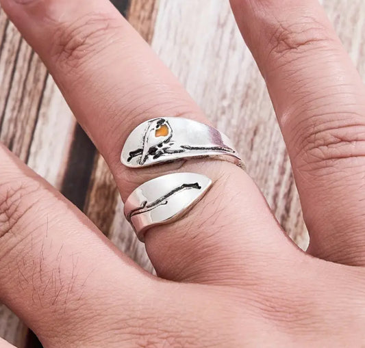 Anillo abierto en acero pajarito