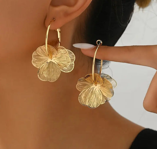 Aros caravanas flor dorada