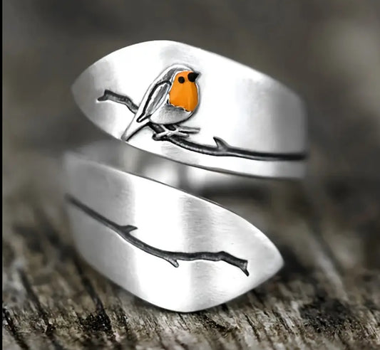 Anillo abierto en acero pajarito