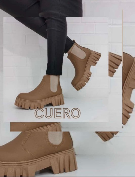 Borcego en cuero suela tractor con elástico